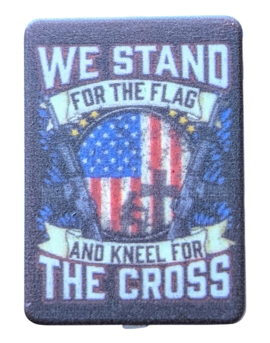 We stand for the flag and kneel for the cross
